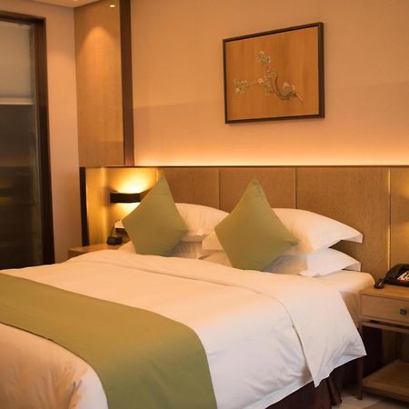 Leshan Ramada Hotel Экстерьер фото
