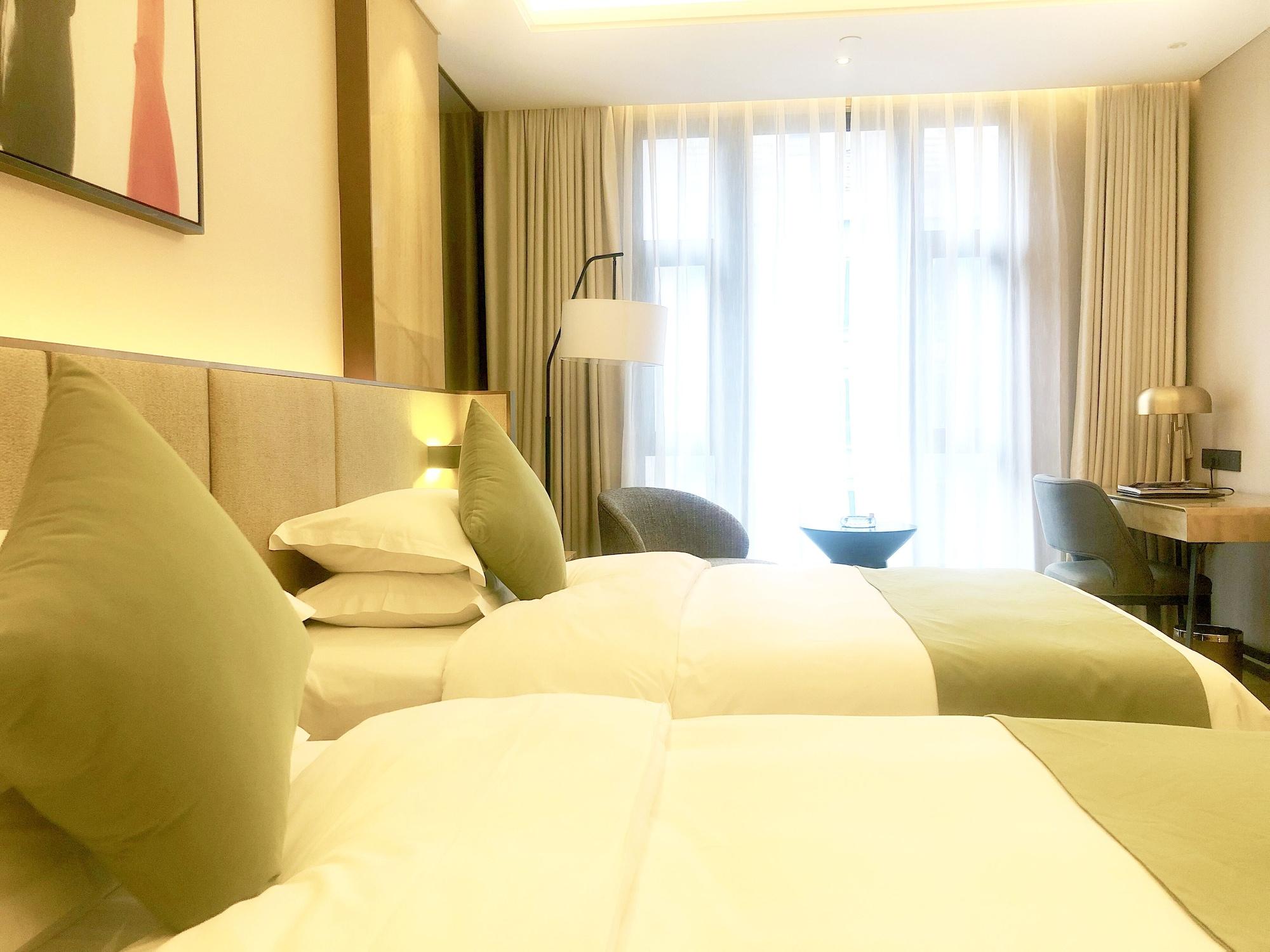 Leshan Ramada Hotel Экстерьер фото