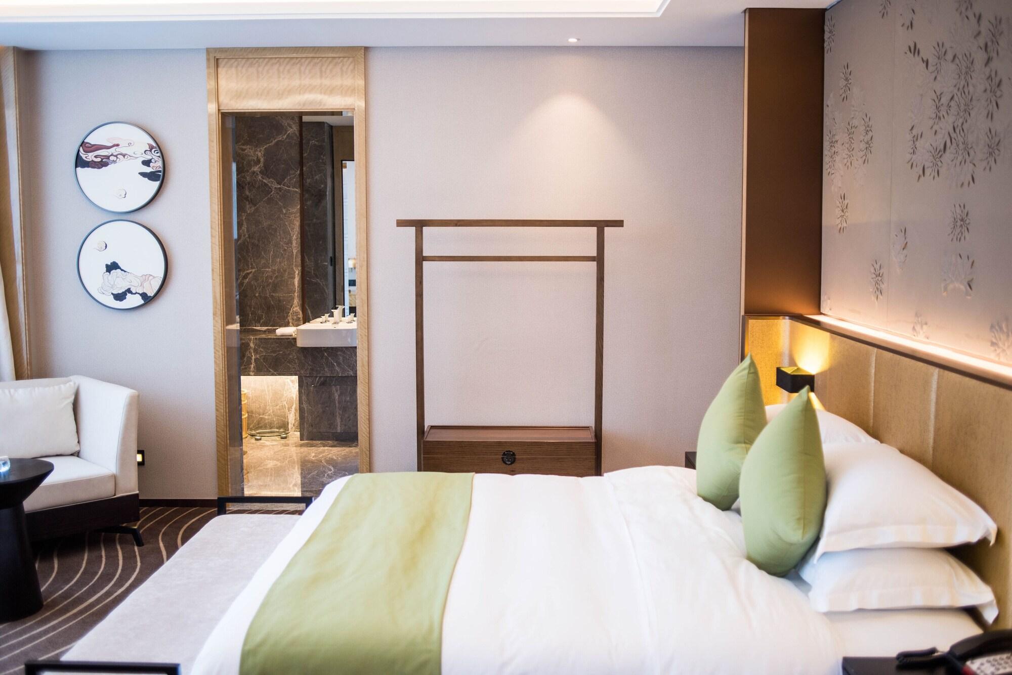 Leshan Ramada Hotel Экстерьер фото