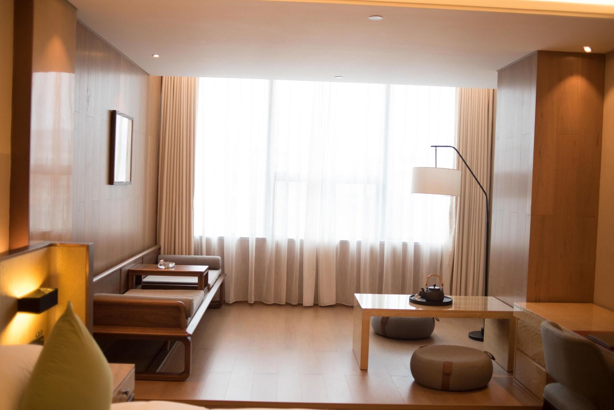 Leshan Ramada Hotel Экстерьер фото