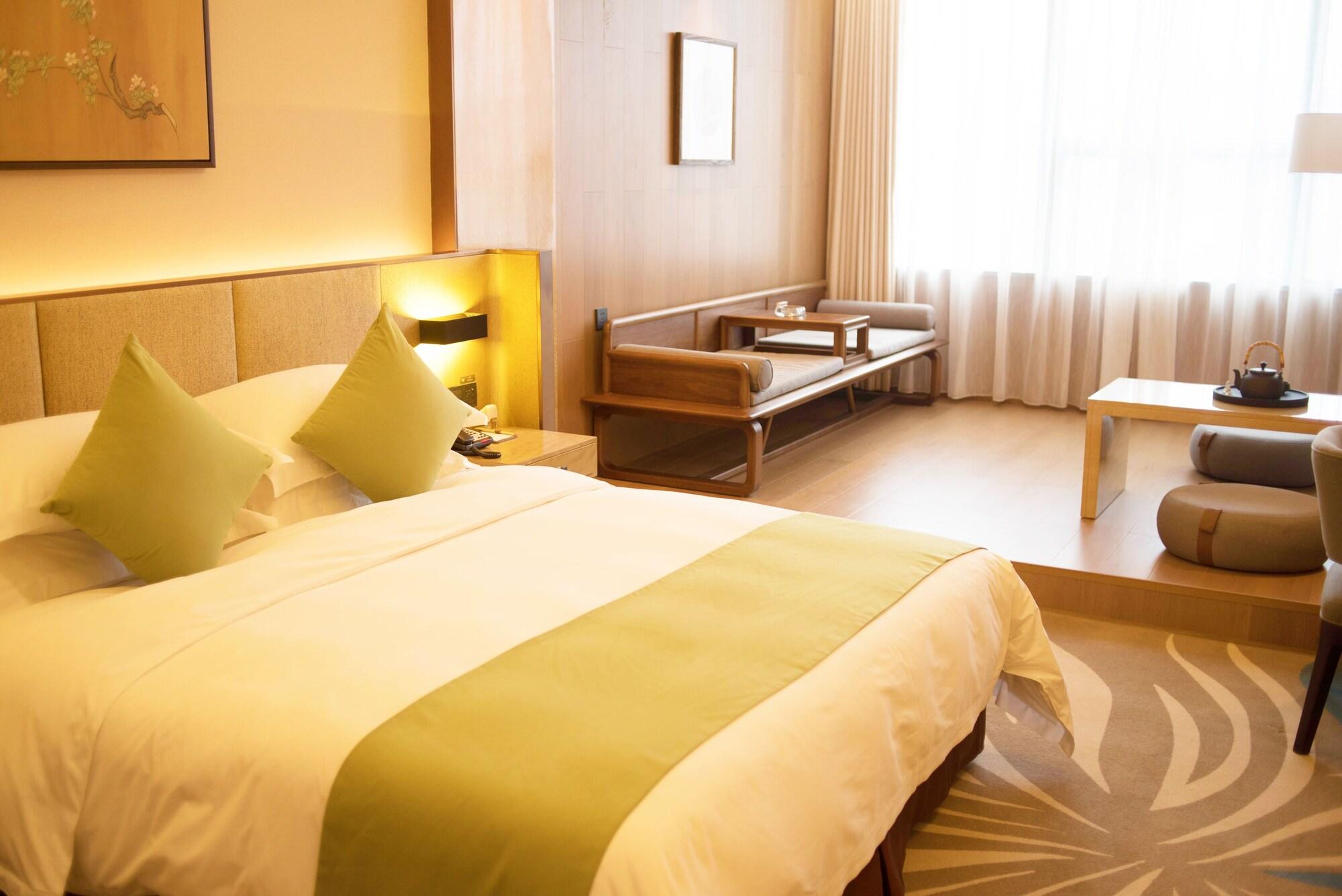 Leshan Ramada Hotel Экстерьер фото