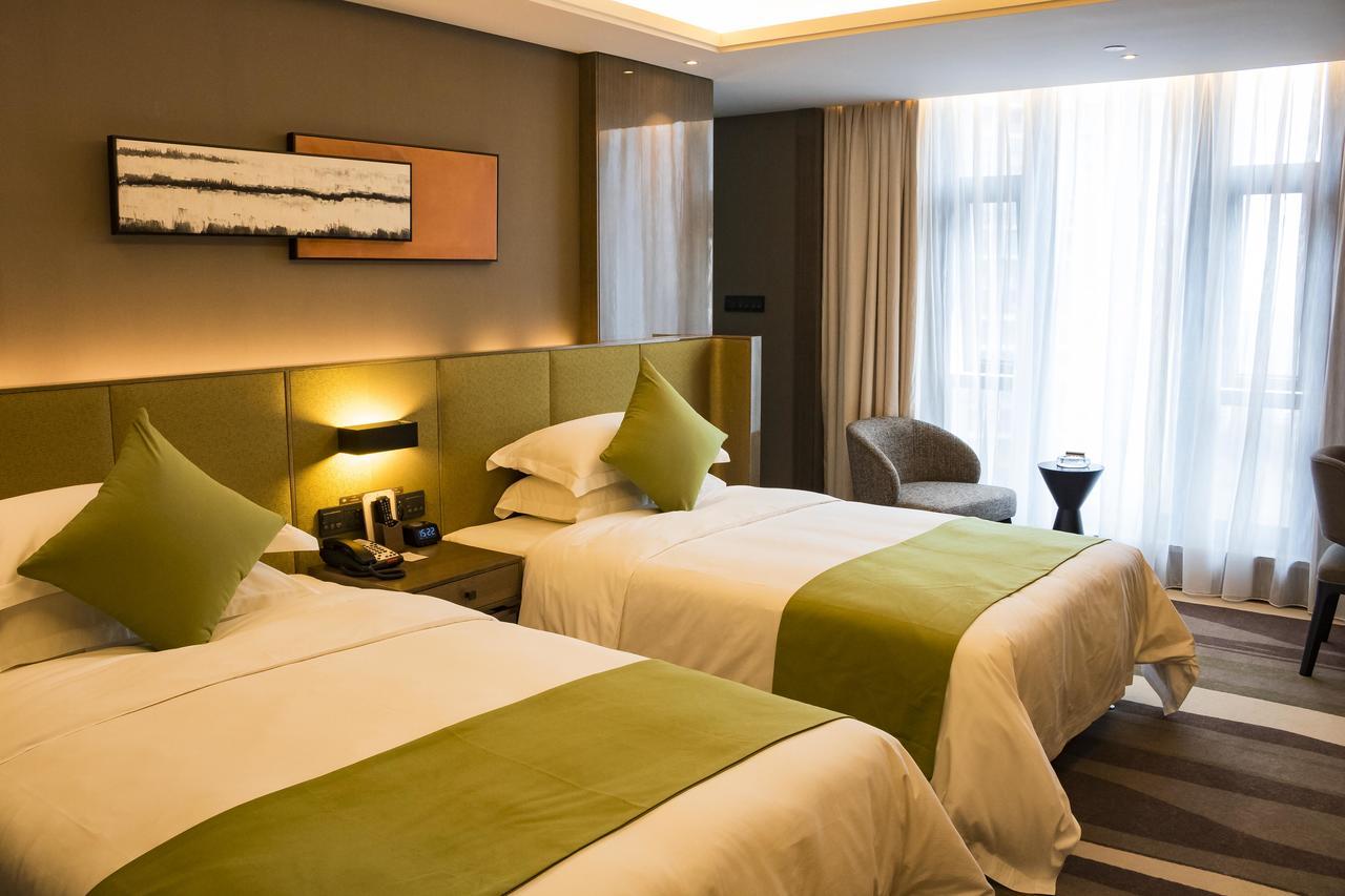 Leshan Ramada Hotel Экстерьер фото