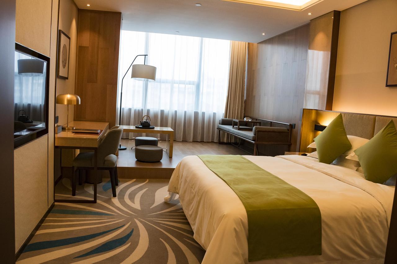 Leshan Ramada Hotel Экстерьер фото